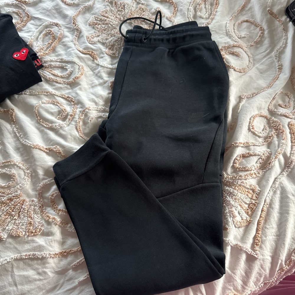 Nike Tech Black Joggers in Medium